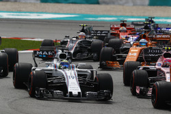 Esteban Ocon, Sahara Force India F1 VJM10, Felipe Massa, Williams FW40, Fernando Alonso, McLaren MCL32, Kevin Magnussen, Haas F1 Team VF-17 at the start