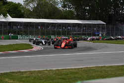 Sebastian Vettel, Ferrari SF71H leads on lap one