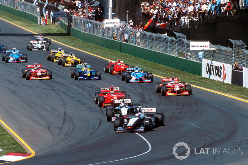 Mika Hakkinen, McLaren Mercedes MP4/13 leads team mate David Coulthard, McLaren Mercedes MP4/13 into