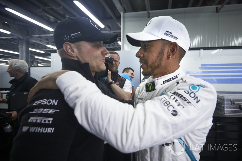 Valtteri Bottas, Mercedes AMG F1, congratulates Lewis Hamilton, Mercedes AMG F1, 1st position