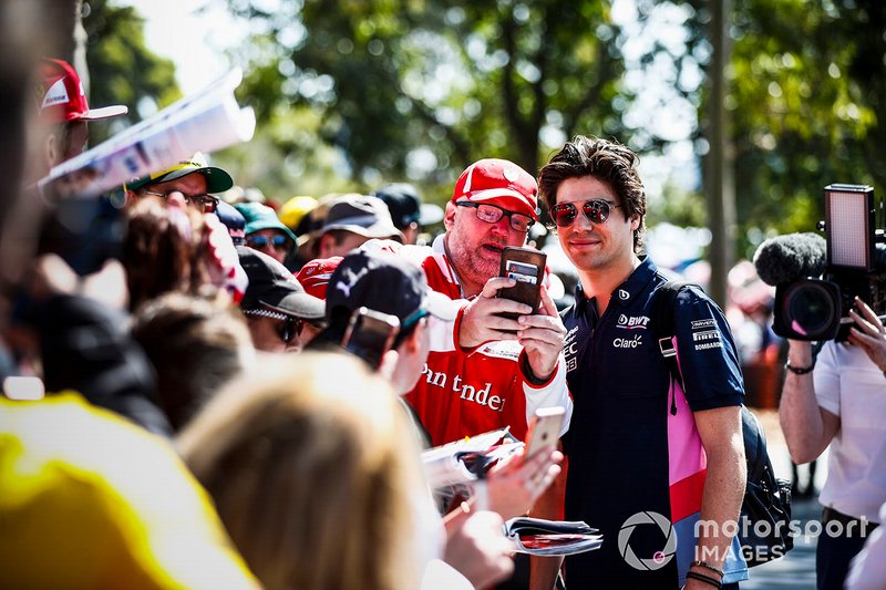 Lance Stroll, Racing Point poses for a selfie with a fan