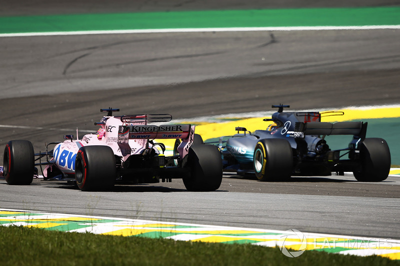 Lewis Hamilton, Mercedes AMG F1 W08, passes Sergio Perez, Sahara Force India F1 VJM10