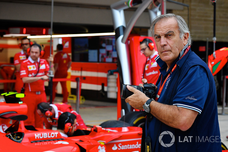 Giorgio Piola works in the F1 pitlane