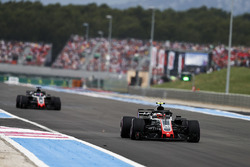 Kevin Magnussen, Haas F1 Team VF-18, leads Romain Grosjean, Haas F1 Team VF-18