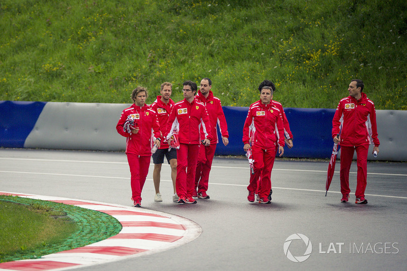 Sebastian Vettel, Ferrari walks the track with the team