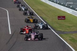 Sergio Perez, Sahara Force India VJM10 and Sebastian Vettel, Ferrari SF70H battle for position