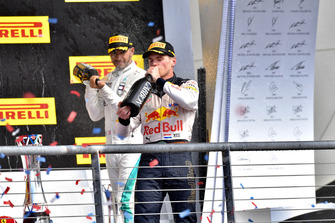 Lewis Hamilton, Mercedes AMG F1 and Max Verstappen, Red Bull Racing celebrate with the champagne on the podium