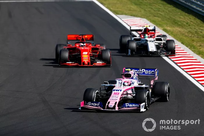Lance Stroll, Racing Point RP19, precede Sebastian Vettel, Ferrari SF90, e Antonio Giovinazzi, Alfa Romeo Racing C38