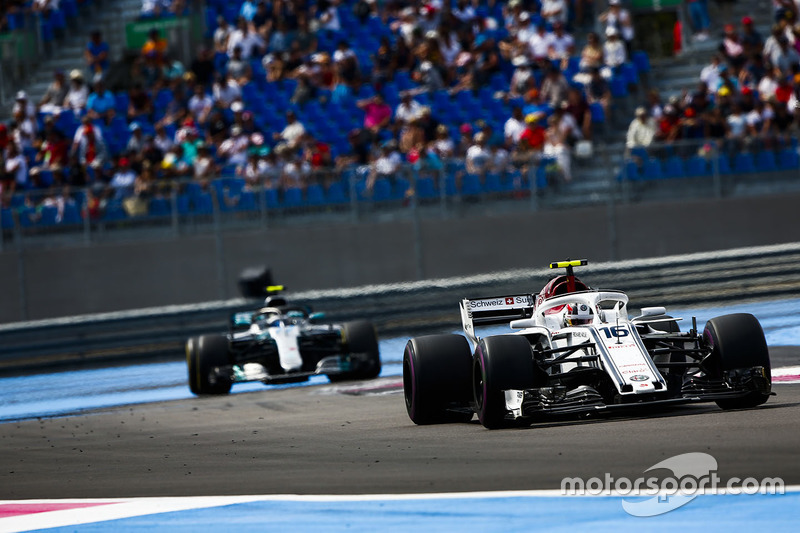 Charles Leclerc, Sauber C37, leads Valtteri Bottas, Mercedes AMG F1 W09