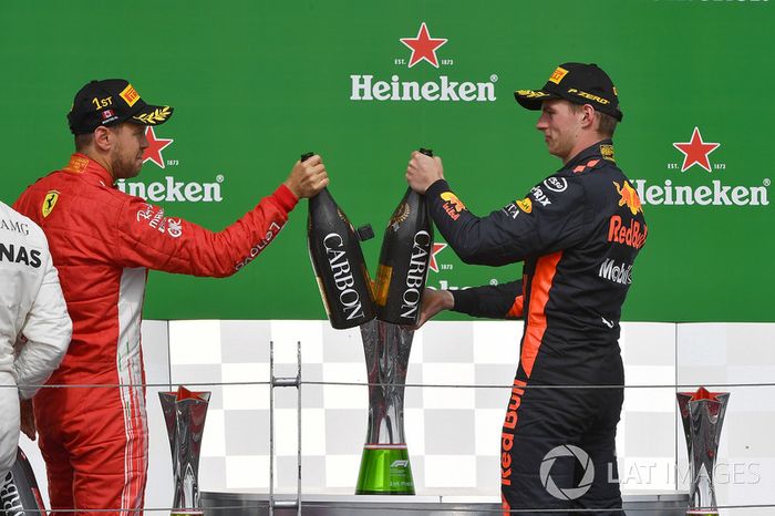 Sebastian Vettel, Ferrari y Max Verstappen, Red Bull Racing