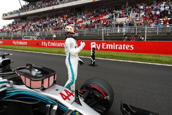 Pole winner Lewis Hamilton, Mercedes AMG F1, acknowledges fans after qualifying