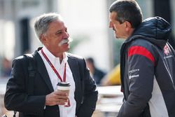 Chase Carey, Chief Executive Officer and Executive Chairman of the Formula One Group and Guenther Steiner, Haas F1 Team Principal