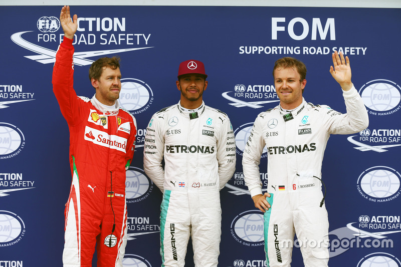 La Top 3 delle qualifiche nel parco chiuso, Sebastian Vettel, Ferrari, terzo; Lewis Hamilton, Merced