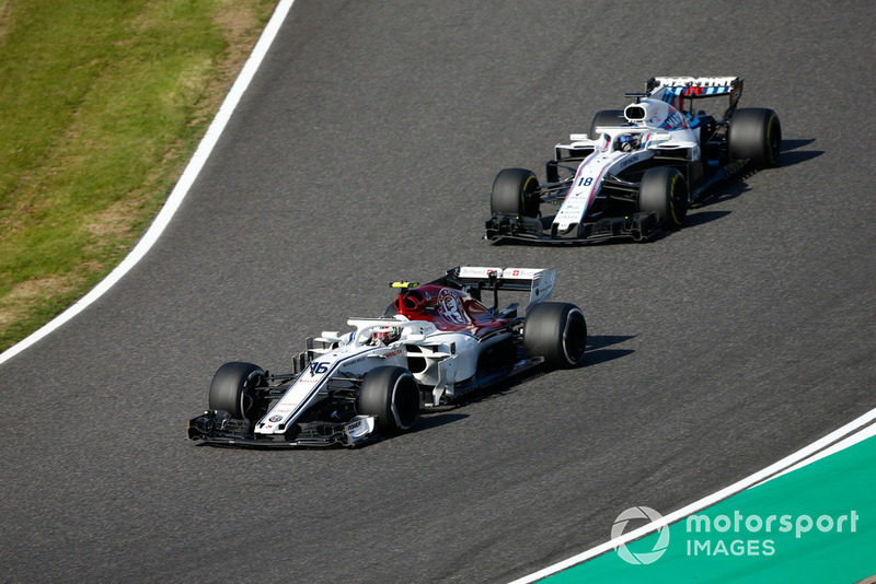 Charles Leclerc, Sauber C37, leads Lance Stroll, Williams FW41