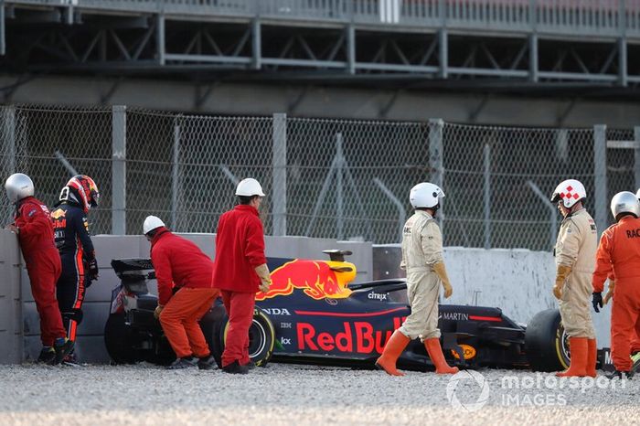 Pierre Gasly, Red Bull Racing RB15 in the gravel after crashing into the barrier