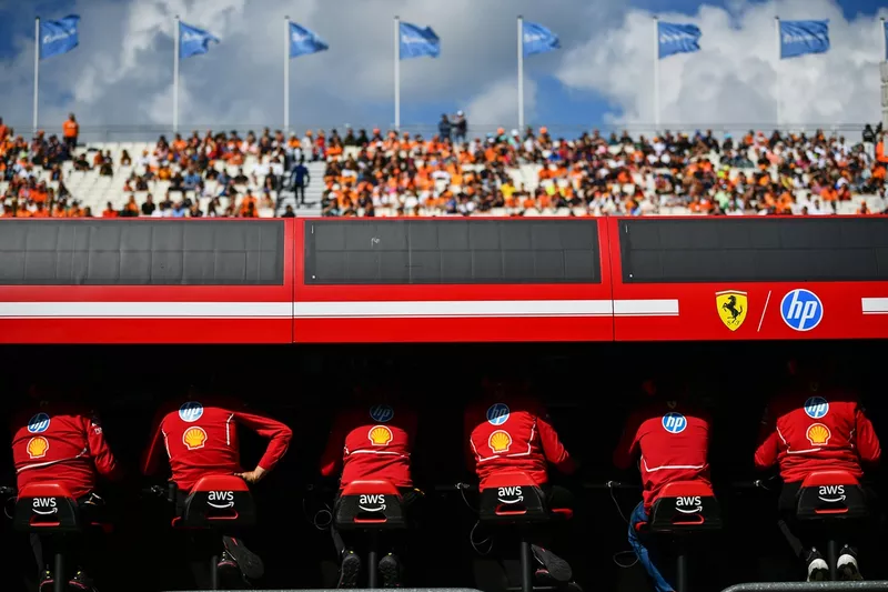 The Ferrari team on the pit wall