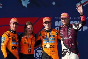Lando Norris, McLaren, Oscar Piastri, McLaren, George Russell, Mercedes, Louise McEwen, Chief Marketing Officer at McLaren
