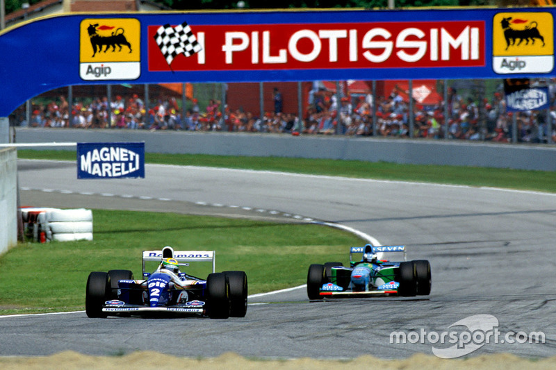 Ayrton Senna, Williams FW16, leads Michael Schumacher, Benetton B194