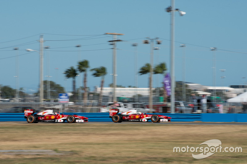 Sebastian Vettel, Ferrari F60; Kimi Räikkönen, Ferrari F60