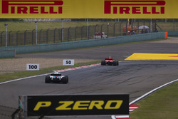 Kimi Raikkonen, Ferrari SF71H, leads Sergey Sirotkin, Williams FW41 Mercedes
