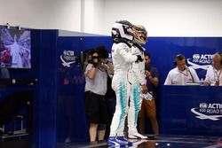 Lewis Hamilton, Mercedes AMG F1 and Valtteri Bottas, Mercedes AMG F1 in parc ferme weigh-in area