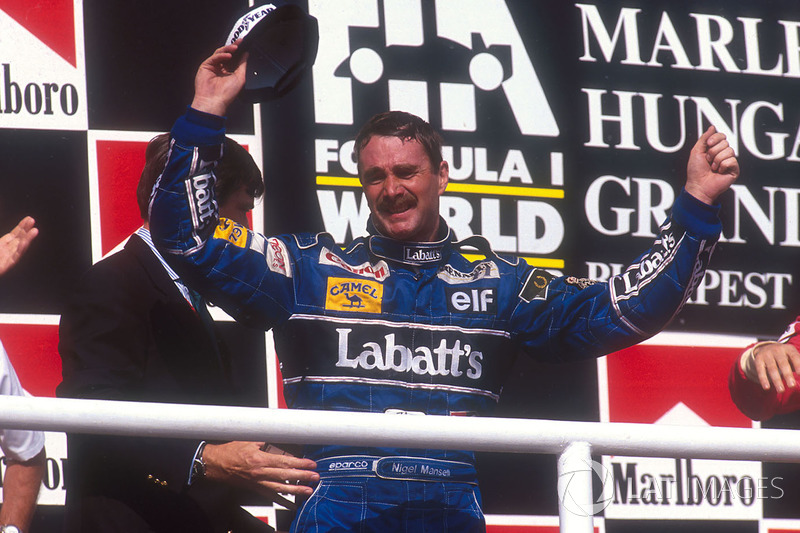 Podium: second place Nigel Mansell, Williams Renault celebrates winning the drivers World Championsh