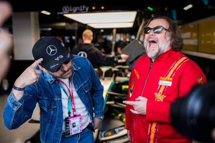 Charlie Day and Jack Black visit the Mercedes AMG F1 Team garage.
