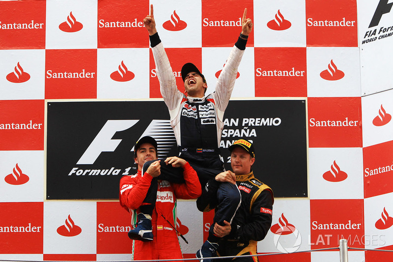 Podium: race winner Pastor Maldonado, Williams, second place Fernando Alonso, Ferrari, and third pla