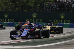 Brendon Hartley, Toro Rosso STR13, leads Nico Hulkenberg, Renault Sport F1 Team R.S. 18, and Fernando Alonso, McLaren MCL33