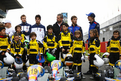 Young karters backed by the RACC, Spain's largest auto club, pose with Valtteri Bottas, Mercedes AMG F1, Sergey Sirotkin, Williams Racing, Lance Stroll, Williams Racing, Pierre Gasly, Toro Rosso, and Brendon Hartley, Toro Rosso