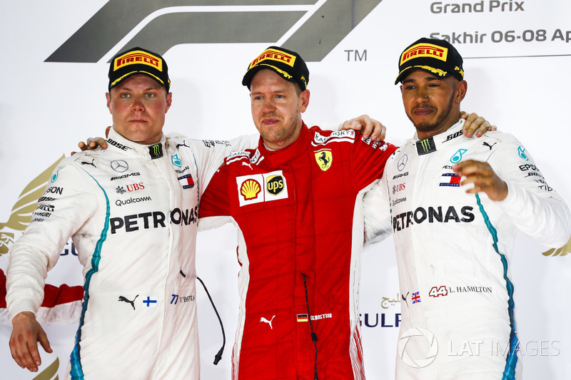 Valtteri Bottas, Mercedes AMG F1, 2nd position, Sebastian Vettel, Ferrari, 1st position, and Lewis H