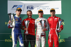 Nyck De Vries, PREMA Racing celebrates on the podium after winning the race with Lando Norris, Carlin, and Antonio Fuoco, Charouz Racing System