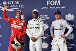 Polesitter Lewis Hamilton, Mercedes AMG F1, second place Sebastian Vettel, Ferrari, third place Valtteri Bottas, Mercedes AMG F1
