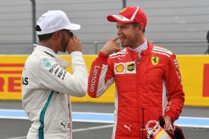 Lewis Hamilton, Mercedes-AMG F1 y Sebastian Vettel, Ferrari 