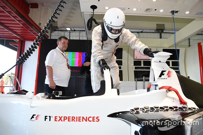 F1 Experiences 2-Seater passenger Will Buxton, NBC TV Presenter and Paul Stoddart