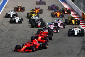 Start action, Sebastian Vettel, Ferrari SF71H, leads Kimi Raikkonen, Ferrari SF71H, and Kevin Magnussen, Haas F1 Team VF-18