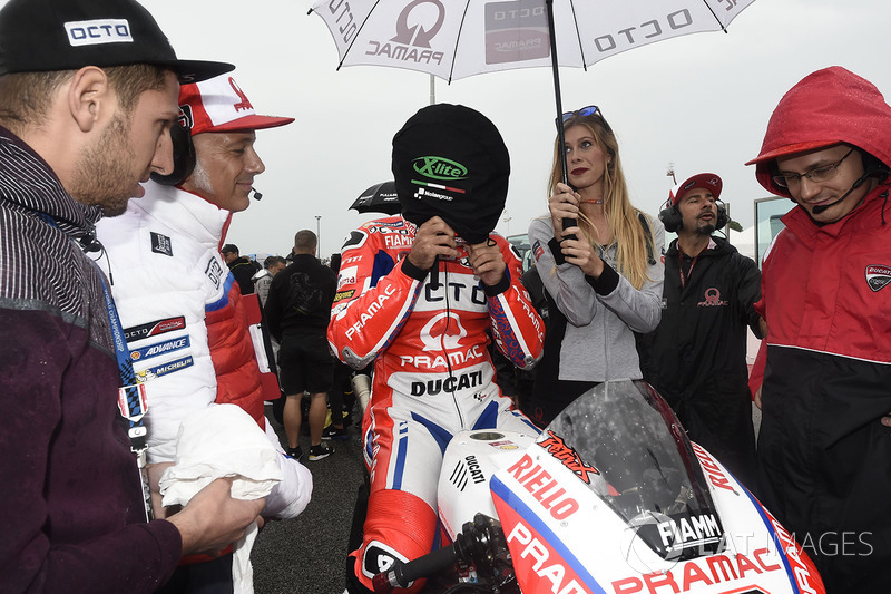 Danilo Petrucci, Pramac Racing, putting his helmet on with the cover still on