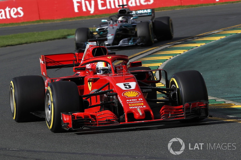 Sebastian Vettel, Ferrari SF71H leads Lewis Hamilton, Mercedes-AMG F1 W09