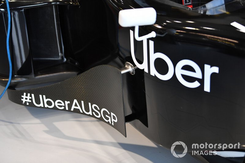 Two-seater side-pod and cockpit detail, including Uber branding