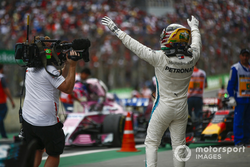 Lewis Hamilton, Mercedes AMG F1, celebrates victory in parc ferme.