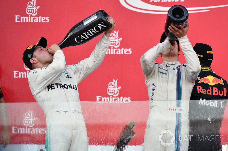 Podio: segundo lugar Valtteri Bottas, Mercedes AMG F1 y el tercer lugar Lance Stroll, Williams