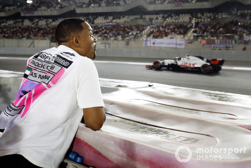 Will Smith watches the race