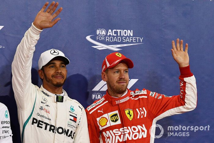 Ganador de la poe Lewis Hamilton, Mercedes AMG F1, y el tercer puesto Sebastian Vettel