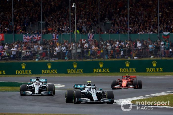 Valtteri Bottas, Mercedes AMG W10, leads Lewis Hamilton, Mercedes AMG F1 W10, and Charles Leclerc, Ferrari SF90