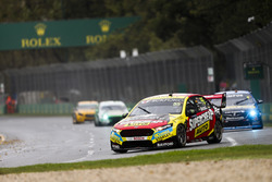 Chaz Mostert, Tickford Racing Ford, leads Nick Percat, Brad Jones Racing Holden