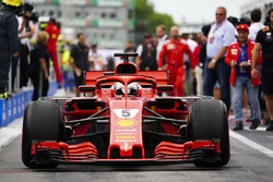 Sebastian Vettel, Ferrari SF71H, 1st position, drives into Parc Ferme