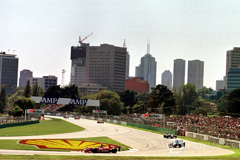 Jacques Villeneuve, Williams, leads Giancarlo Fisichella, Benetton and Johnny Herbert, Sauber