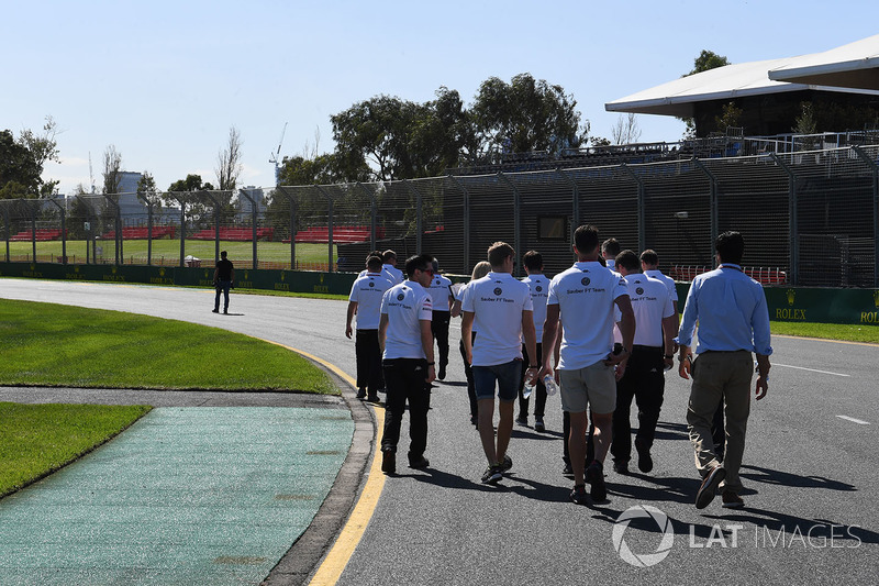 The Alfa Romeo Sauber F1 Team walk the track
