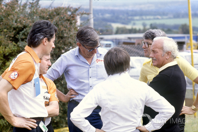 Team owners and sponsors discuss the proposed drivers strike: Daniele Audetto, Alan Rees, Ken Tyrrell, Bernie Ecclestone, Peter Warr and Colin Chapman