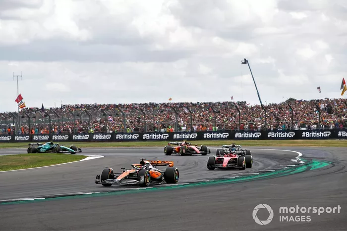 Oscar Piastri, McLaren MCL60, Charles Leclerc, Ferrari SF-23, George Russell, Mercedes F1 W14